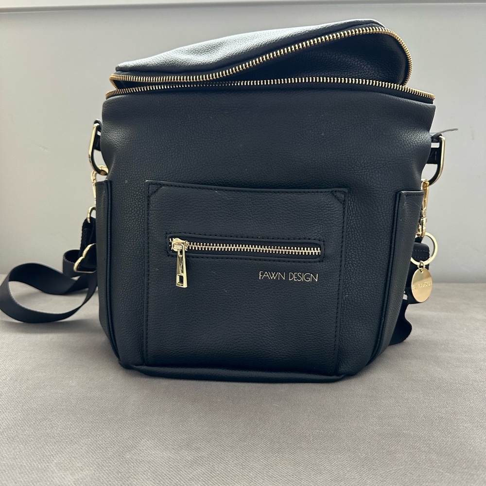 Gently used Fawn small backpack bag/purse. In perfect condition.